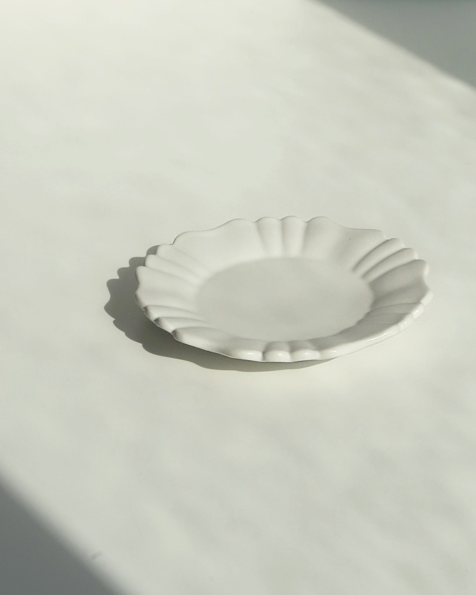 Rinka 6 Petal Plate - R110